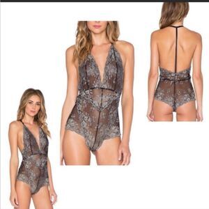 Free People Too Cute To Handle Bodysuit In Charcoal Black